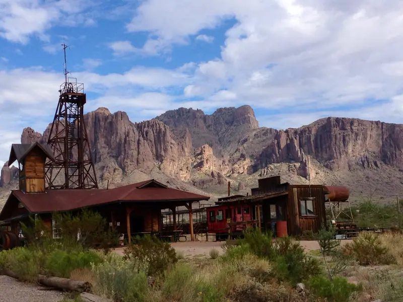 Goldfield Ghost Town with Superstition Mountains behind, Apache Junction, Arizona