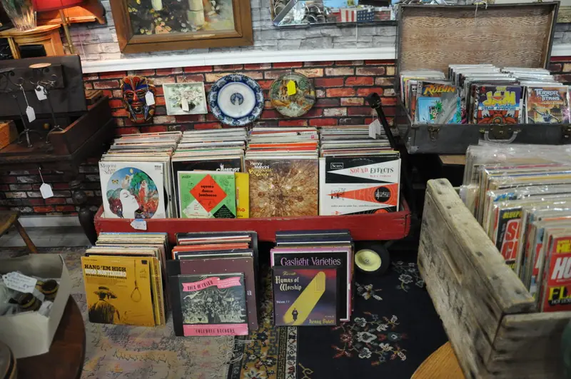 Crates and rows of vintage record albums for sale at Sample Studios